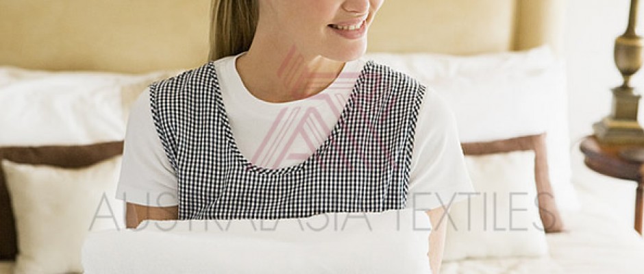 photodune-339424-maid-holding-towels-in-hotel-room-smiling-s